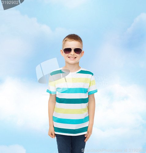 Image of smiling cute little boy in sunglasses