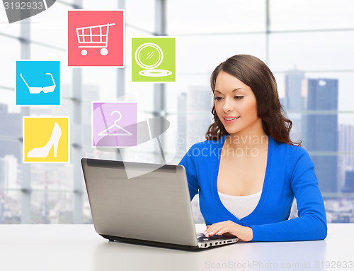 Image of smiling businesswoman or student with laptop