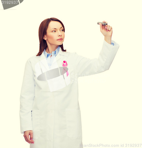 Image of female doctor with breast cancer awareness ribbon