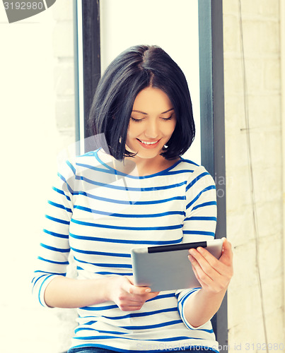 Image of happy teenage girl with tablet pc computer