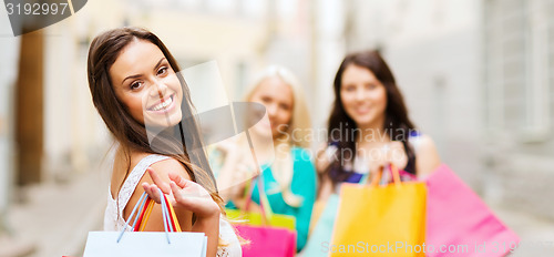 Image of girls with shopping bags in ctiy