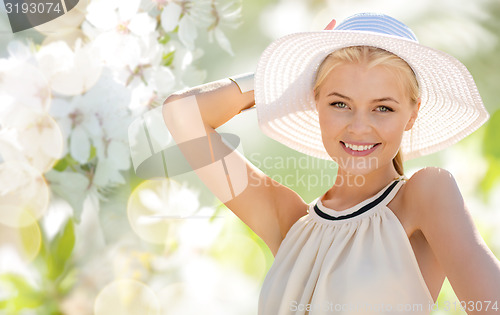 Image of beautiful woman enjoying summer outdoors