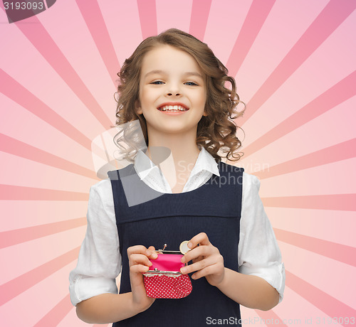 Image of happy girl with purse and euro coin money