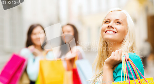 Image of girls with shopping bags in ctiy