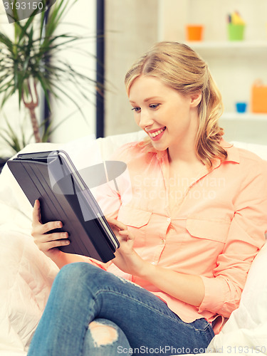 Image of happy woman with tablet pc computer