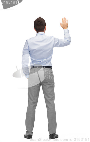 Image of businessman waving hand