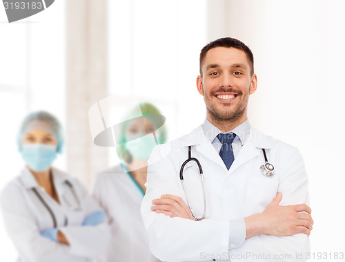 Image of smiling male doctor with stethoscope