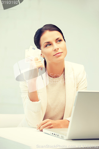 Image of lovely woman with euro cash money