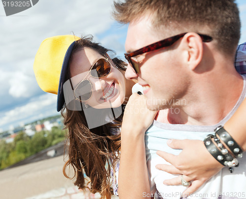 Image of teenagers having fun outside