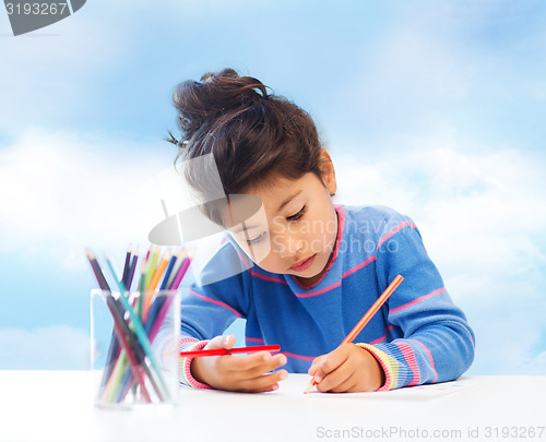 Image of little girl drawing