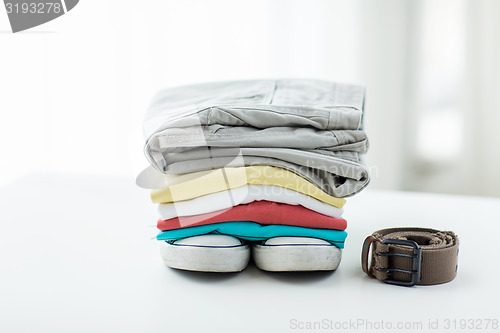 Image of close up of clothes and accessories on table