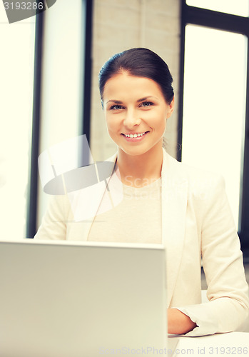 Image of happy woman with laptop computer