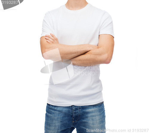 Image of smiling young man in blank white t-shirt