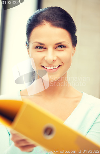 Image of woman with folder