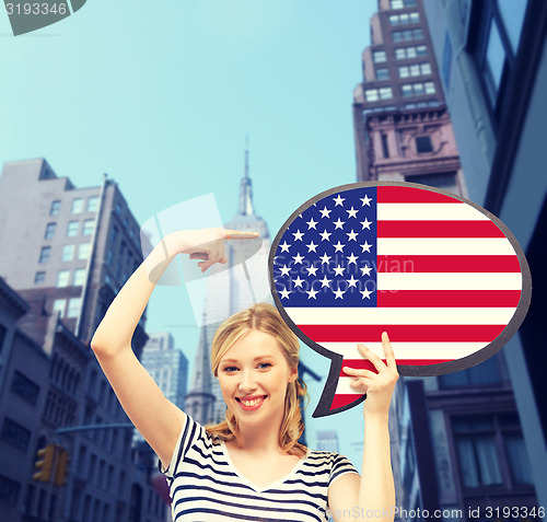 Image of smiling woman with text bubble of american flag
