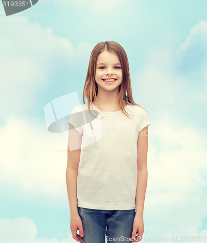 Image of smiling little girl in white blank t-shirt