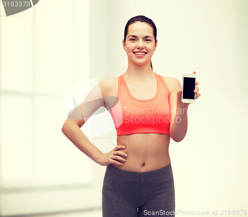 Image of sporty woman with smartphone