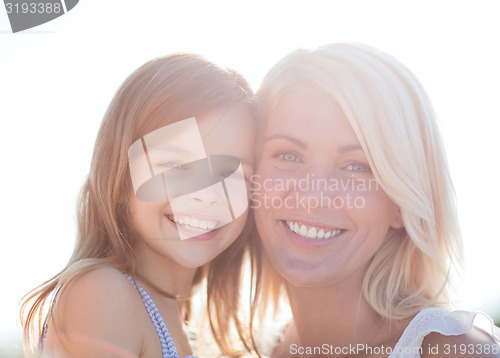 Image of happy mother and child girl