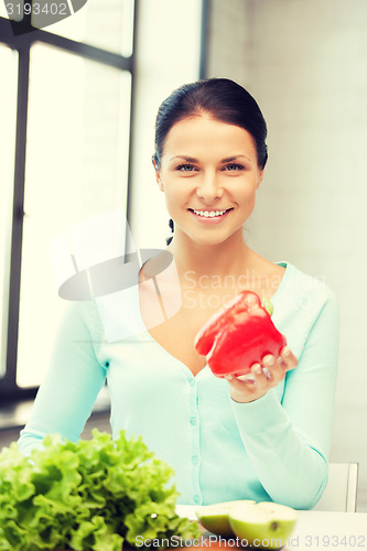 Image of beautiful woman in the kitchen