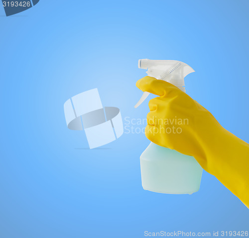 Image of close up of hand with cleanser spraying