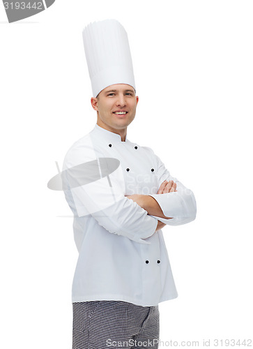 Image of happy male chef cook with crossed hands