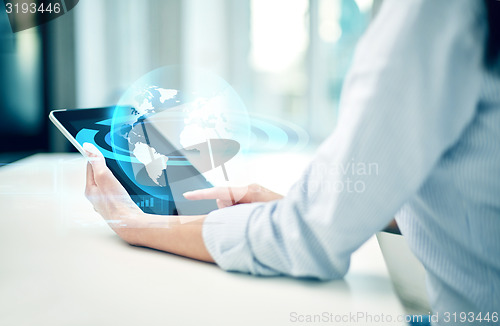 Image of close up of woman hands with tablet pc at office
