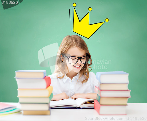 Image of student girl reading books at school