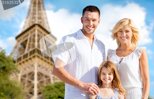 Image of happy family in paris over eiffel tower background