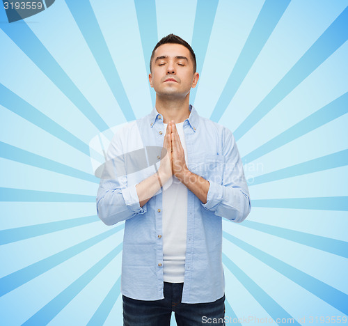 Image of happy man praying