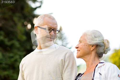 Image of senior couple in city park