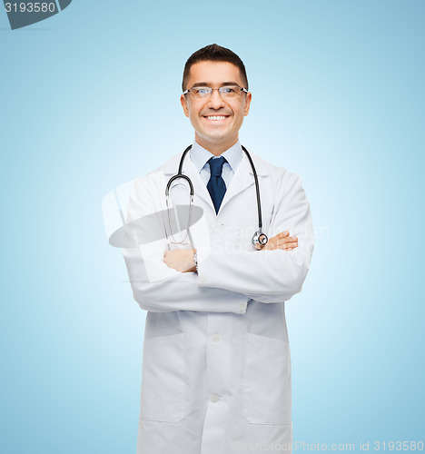 Image of smiling male doctor in white coat