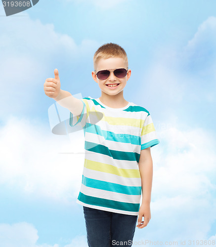 Image of smiling cute little boy in sunglasses