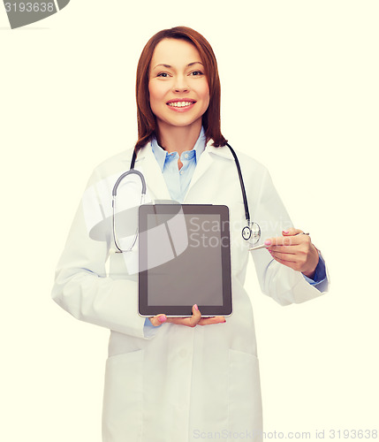 Image of doctor with stethoscope and blank tablet pc screen