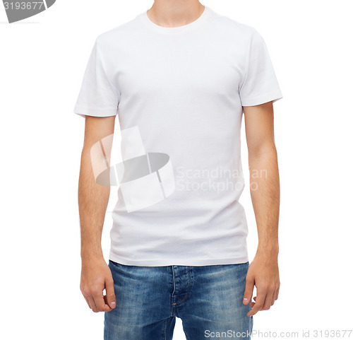 Image of smiling young man in blank white t-shirt