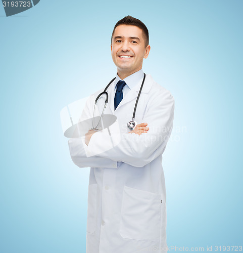 Image of smiling male doctor in white coat