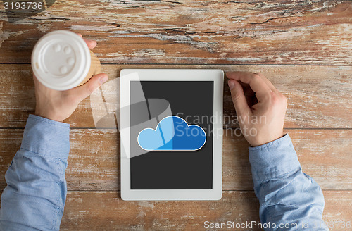 Image of close up of male hands with cloud on tablet pc 