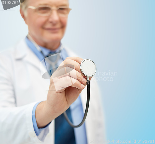 Image of close up of doctor in white coat with stethoscope