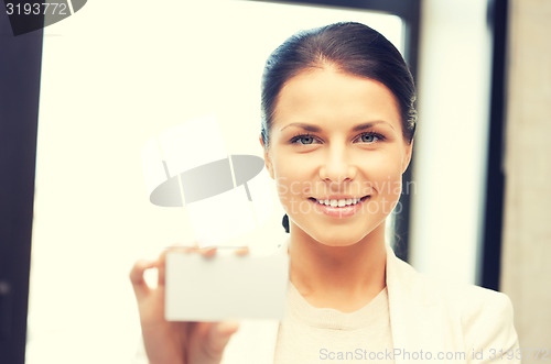 Image of woman with business card