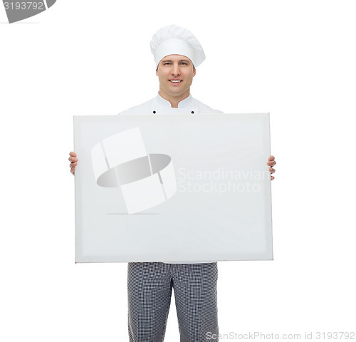 Image of happy male chef cook holding white blank big board