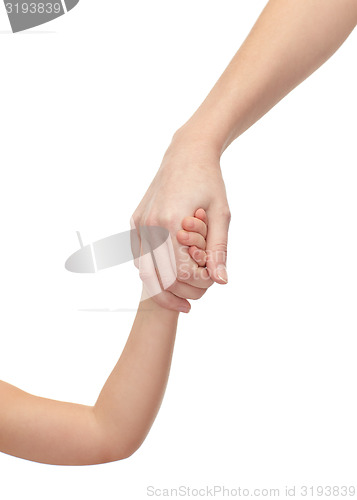 Image of close up of woman and little girl holding hands