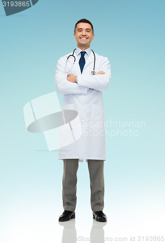 Image of smiling male doctor in white coat