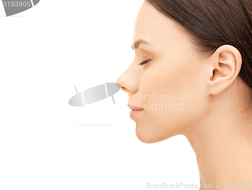 Image of profile portrait of young woman