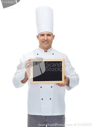 Image of happy male chef cook holding blank menu board