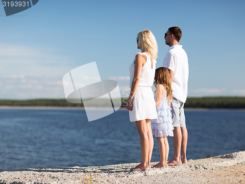 Image of happy family at the seaside