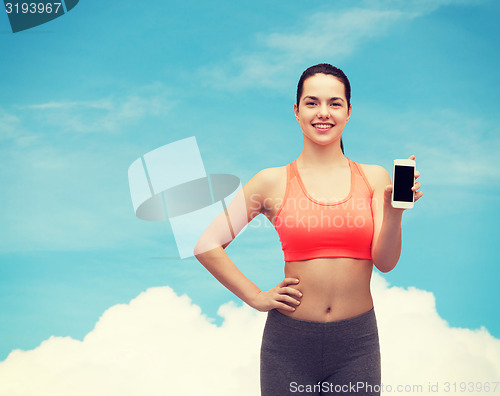 Image of sporty woman with smartphone