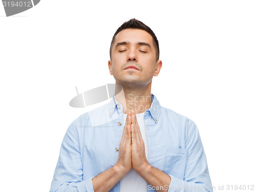 Image of happy man praying