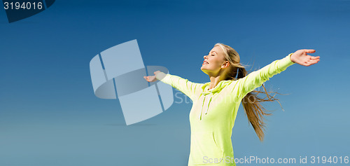Image of woman doing sports outdoors