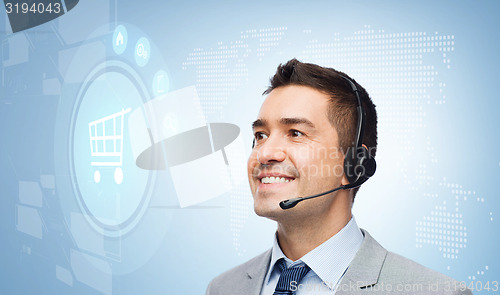 Image of businessman with headset and shopping trolley icon