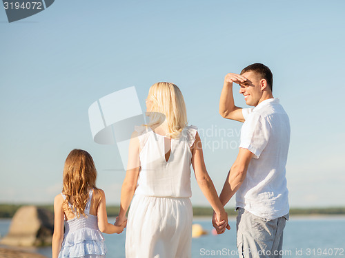 Image of happy family at the seaside