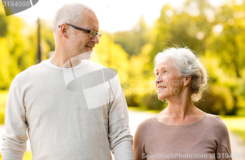 Image of senior couple in city park